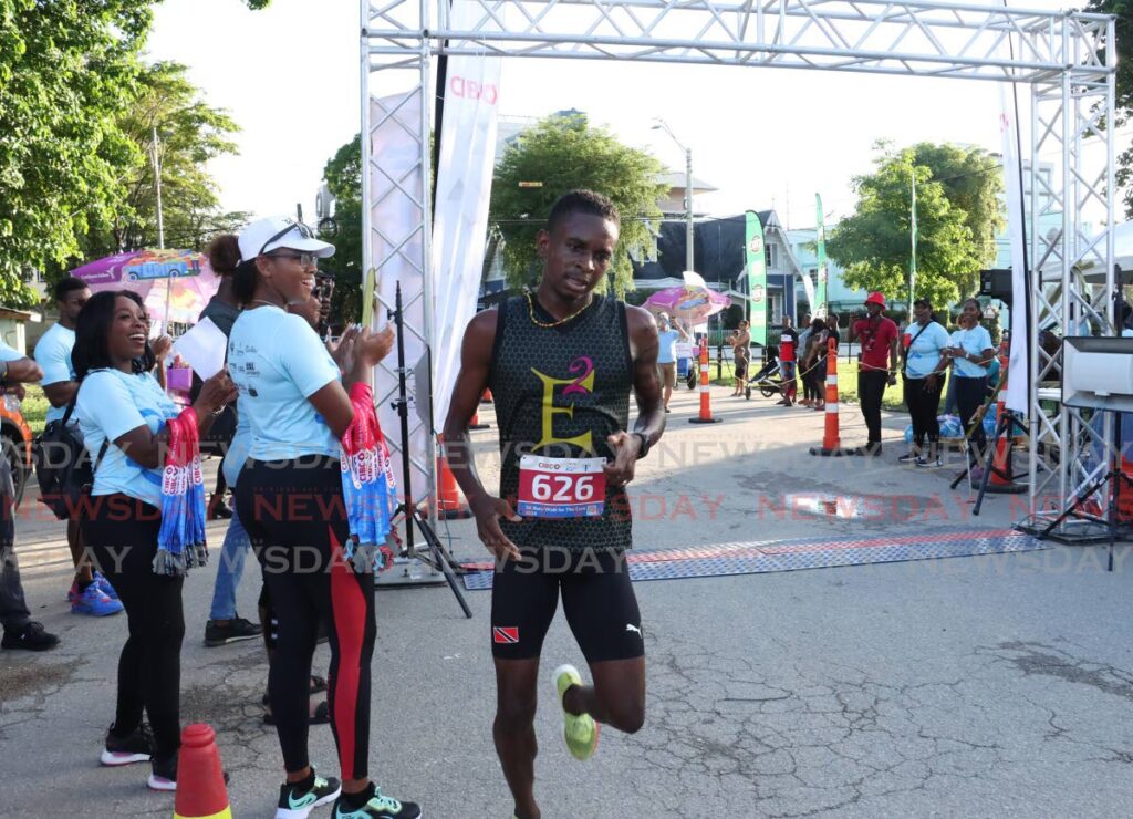 tafari-waldron,-samantha-shukla-seal-victory-at-uwi-spec-half-marathon